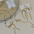 The Gilded Bow Jewelry Set